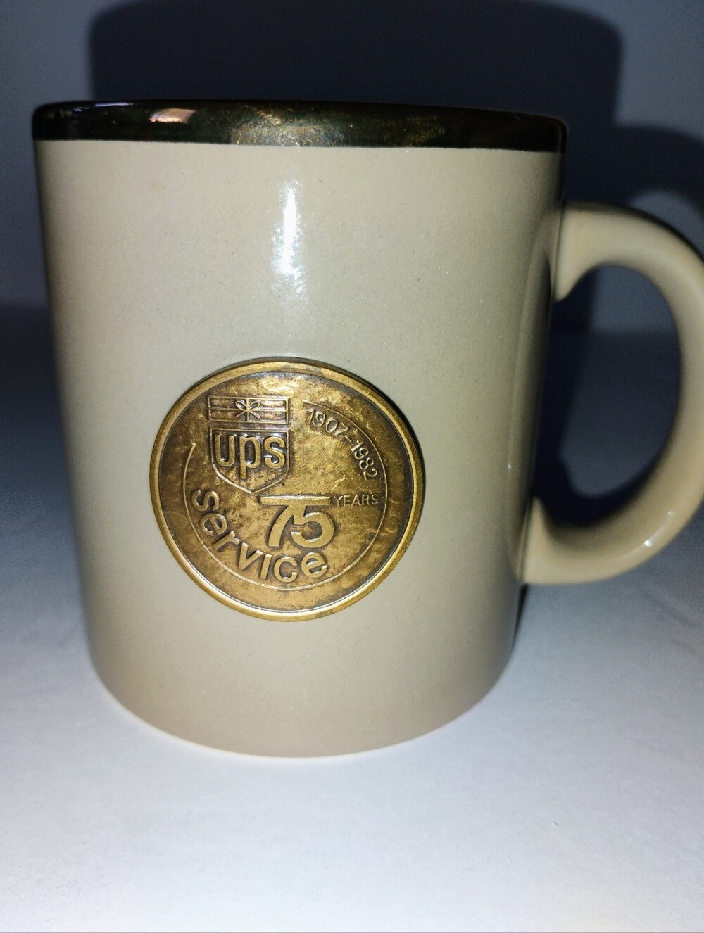 UPS Service 75 Years 1907-1982 Tan Ceramic Mug Gold Rim W. Germany.